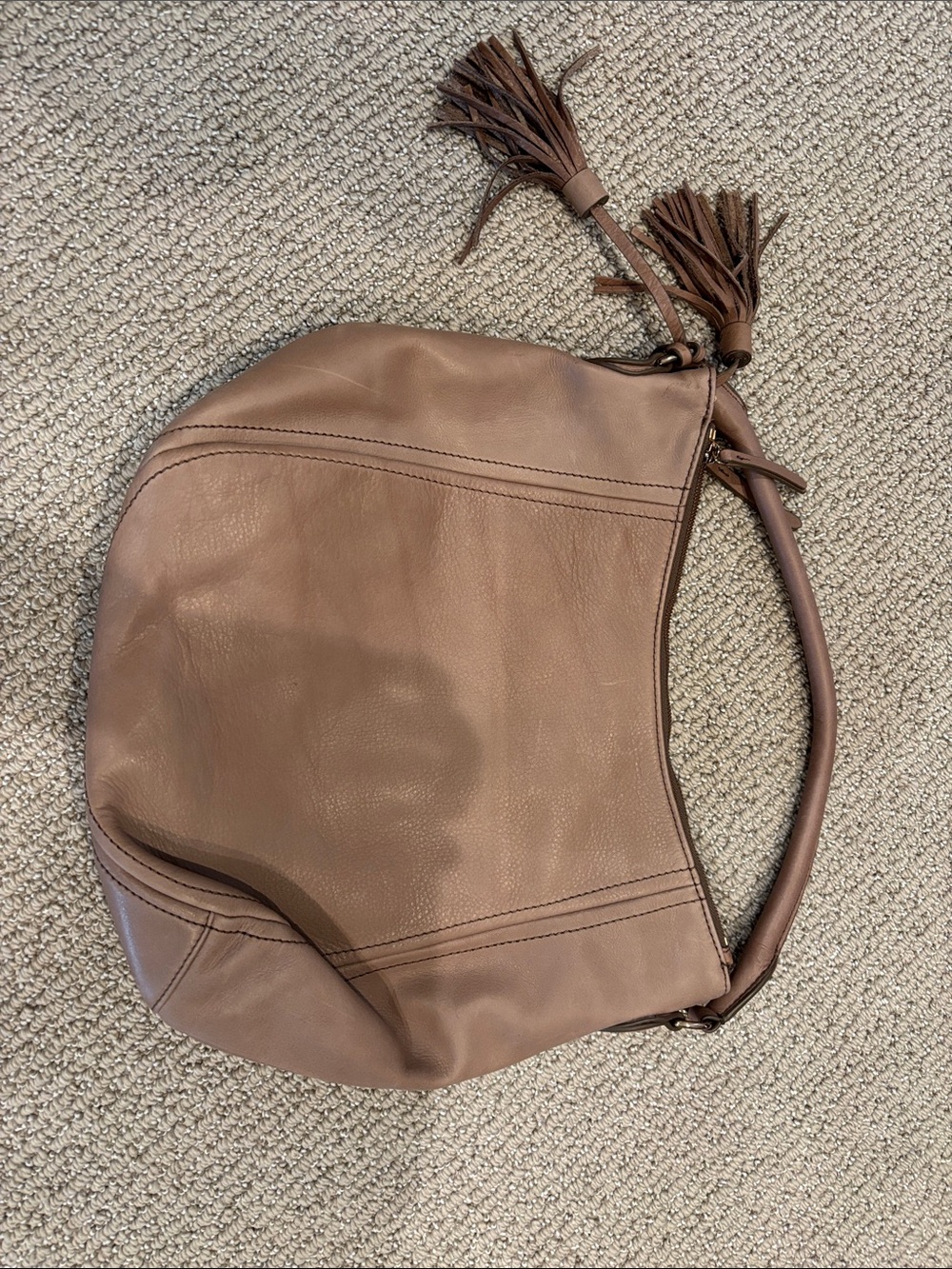 Womenโs Brown Leather Hobo Bag with Tassel Detail